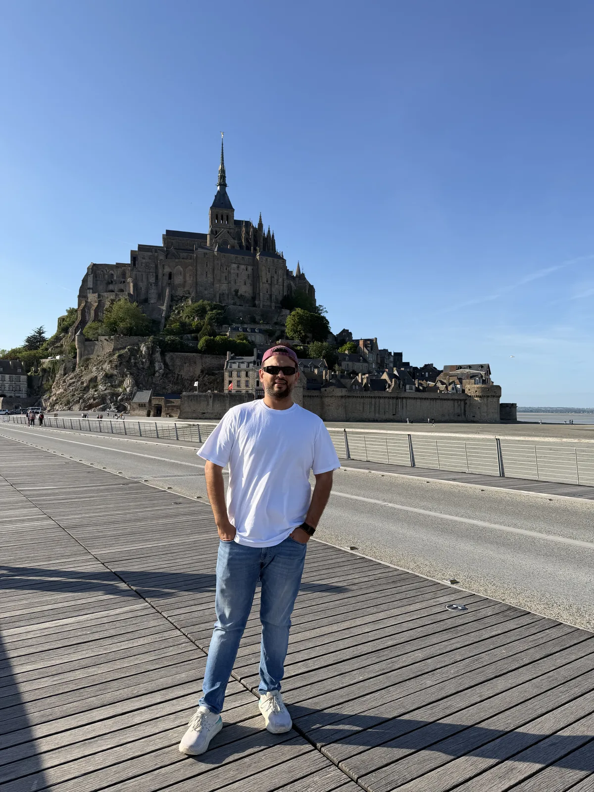 Standing on the causeway at Mont Saint Michel, Normandy